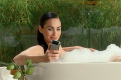 Megan Fox heats up bath tub for Motorola Devour Super Bowl ad